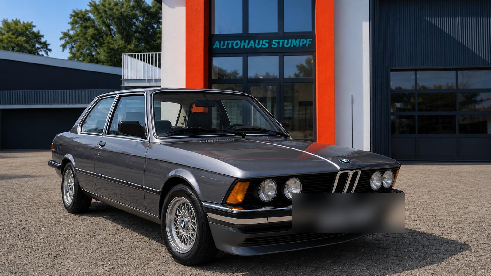 Klassischer BMW E21 vor dem Autohaus Stumpf